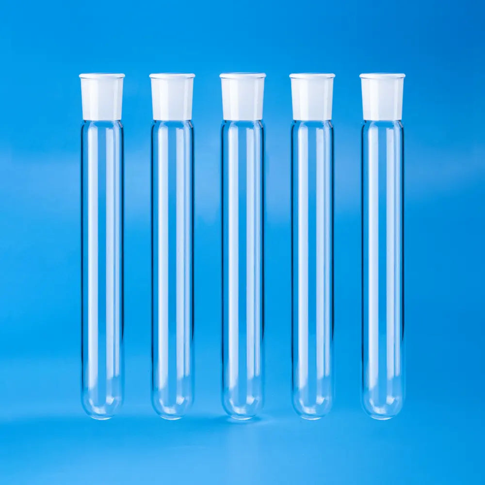 A row of five clear high-purity quartz reaction tubes with standard ground joints and stoppers, arranged neatly on a blue background
