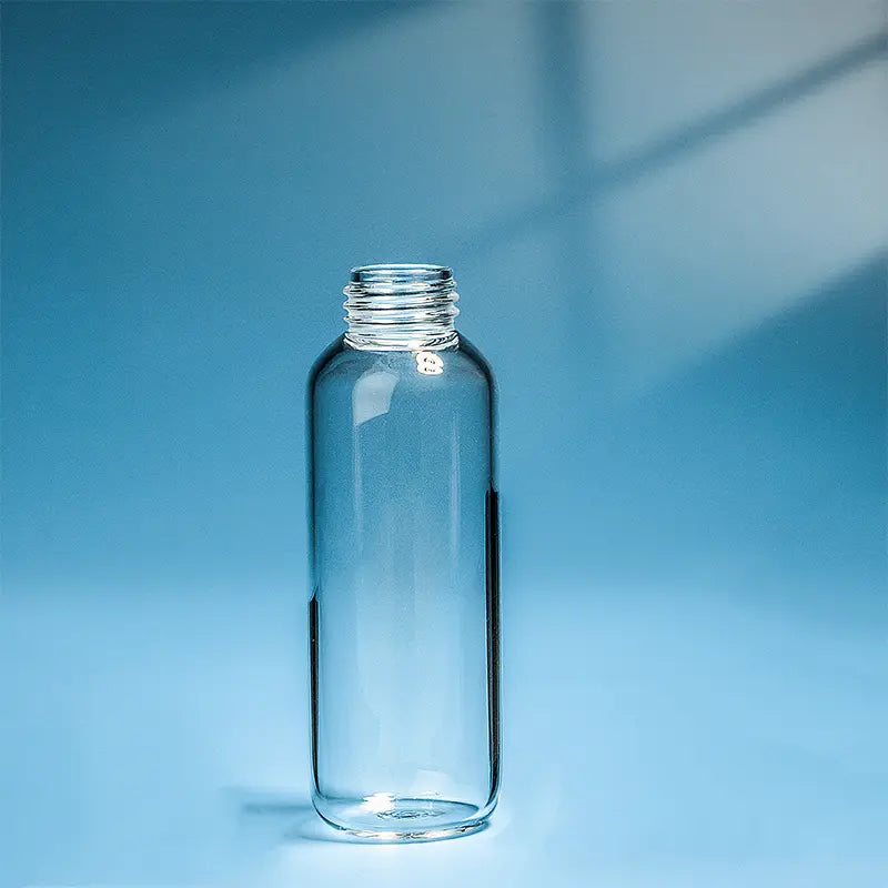 A single clear quartz glass bottle with a threaded neck, used for high-purity sample storage on a blue background.