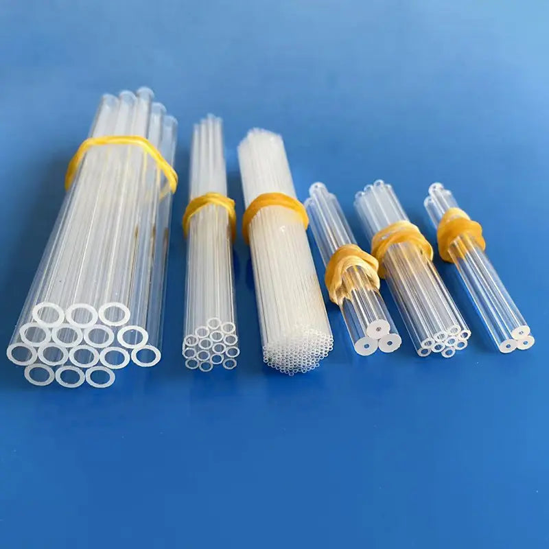 Assorted bundles of clear and multi-bore quartz capillary tubes in various diameters.
