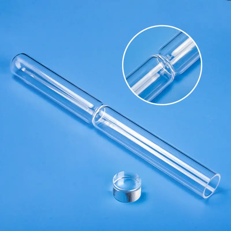 Clear quartz tube for vacuum sealing with a central neck-down constriction, displayed alongside a small quartz ring, highlighting customization options