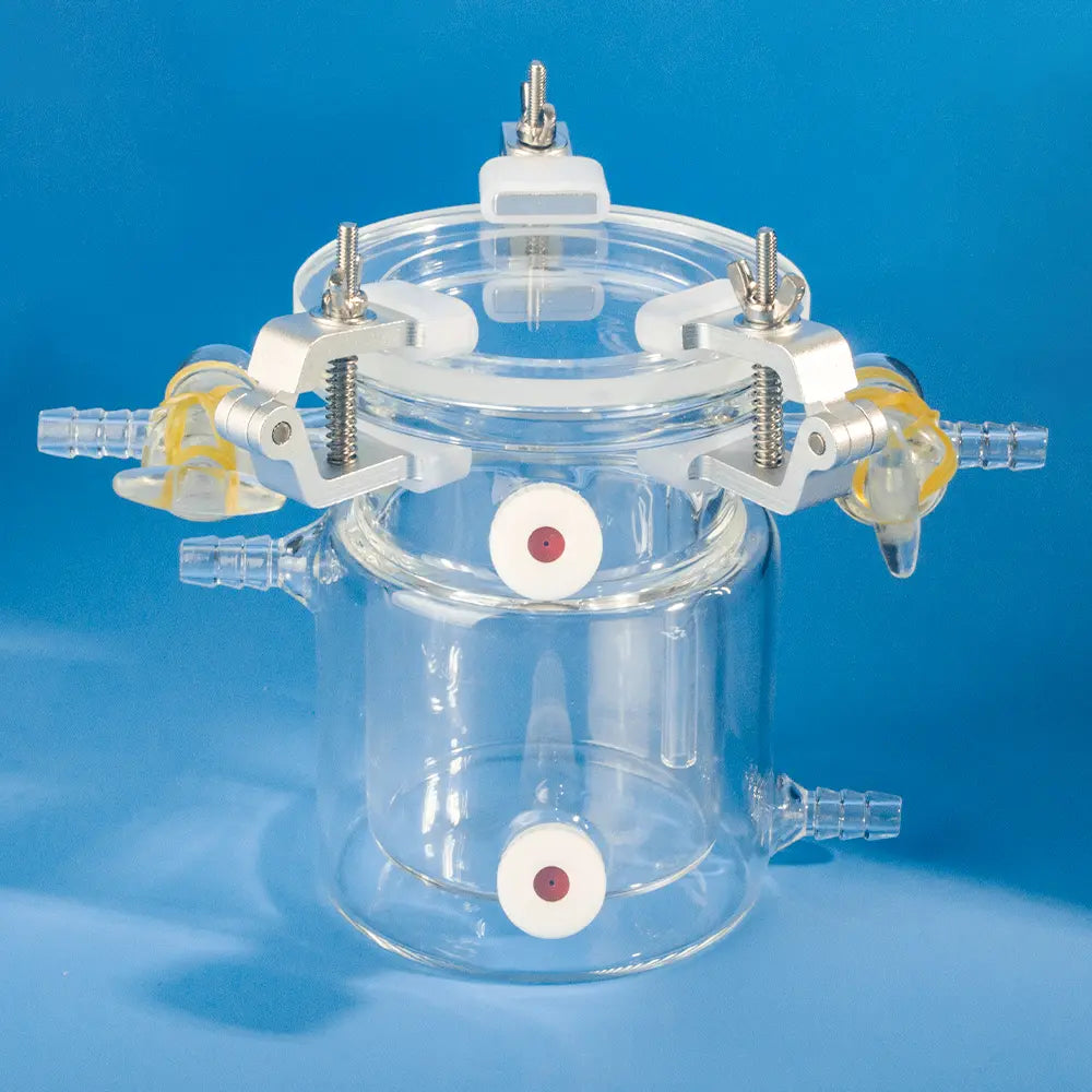 Quartz glass photocatalytic reactor assembly with lid, ports, and clamps.