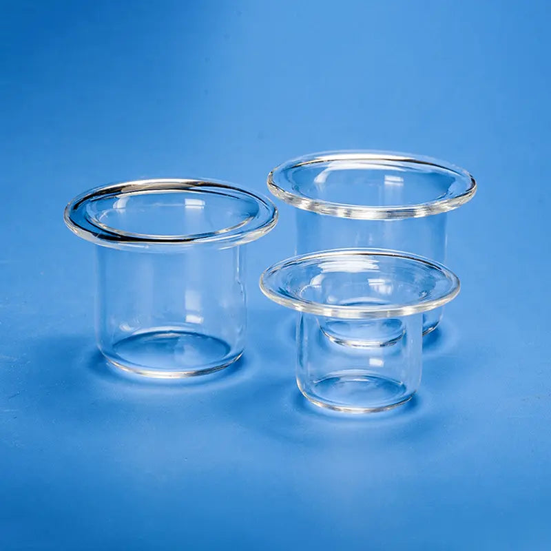 Three clear quartz micro crucibles/evaporating dishes of different sizes, showcasing their smooth finish and transparent appearance.
