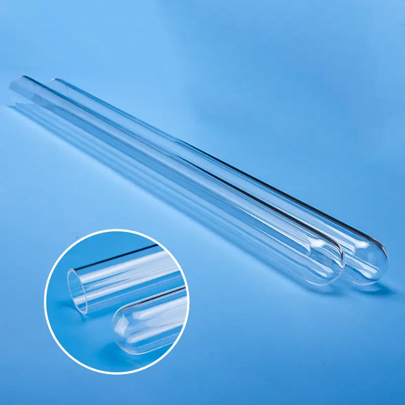 Two clear quartz glass sleeves on a blue background, showcasing their polished finish and rounded ends, with a close-up of the open end.
