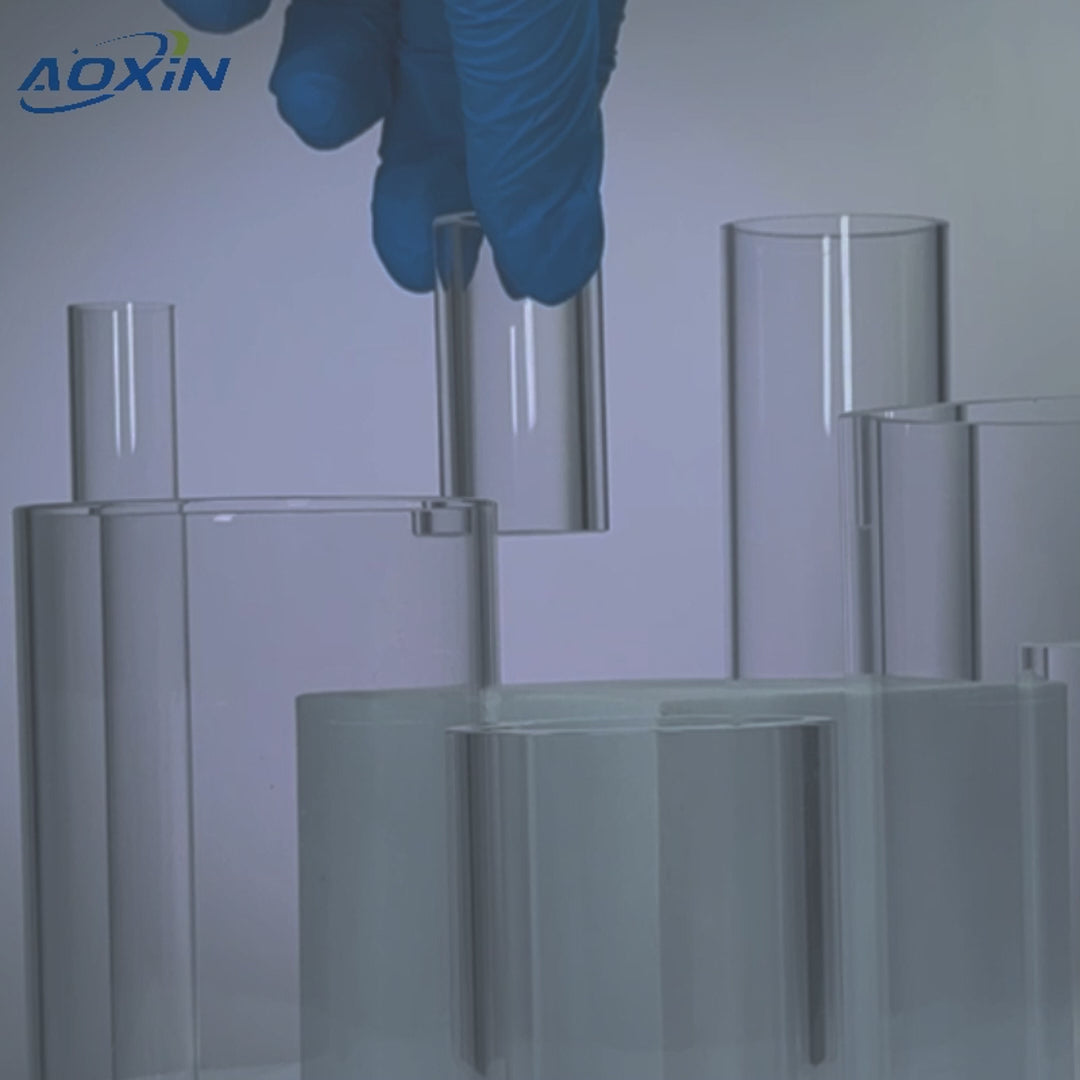 Assortment of high-purity quartz glass tubes with varying diameters and lengths, demonstrating 1200°C heat resistance